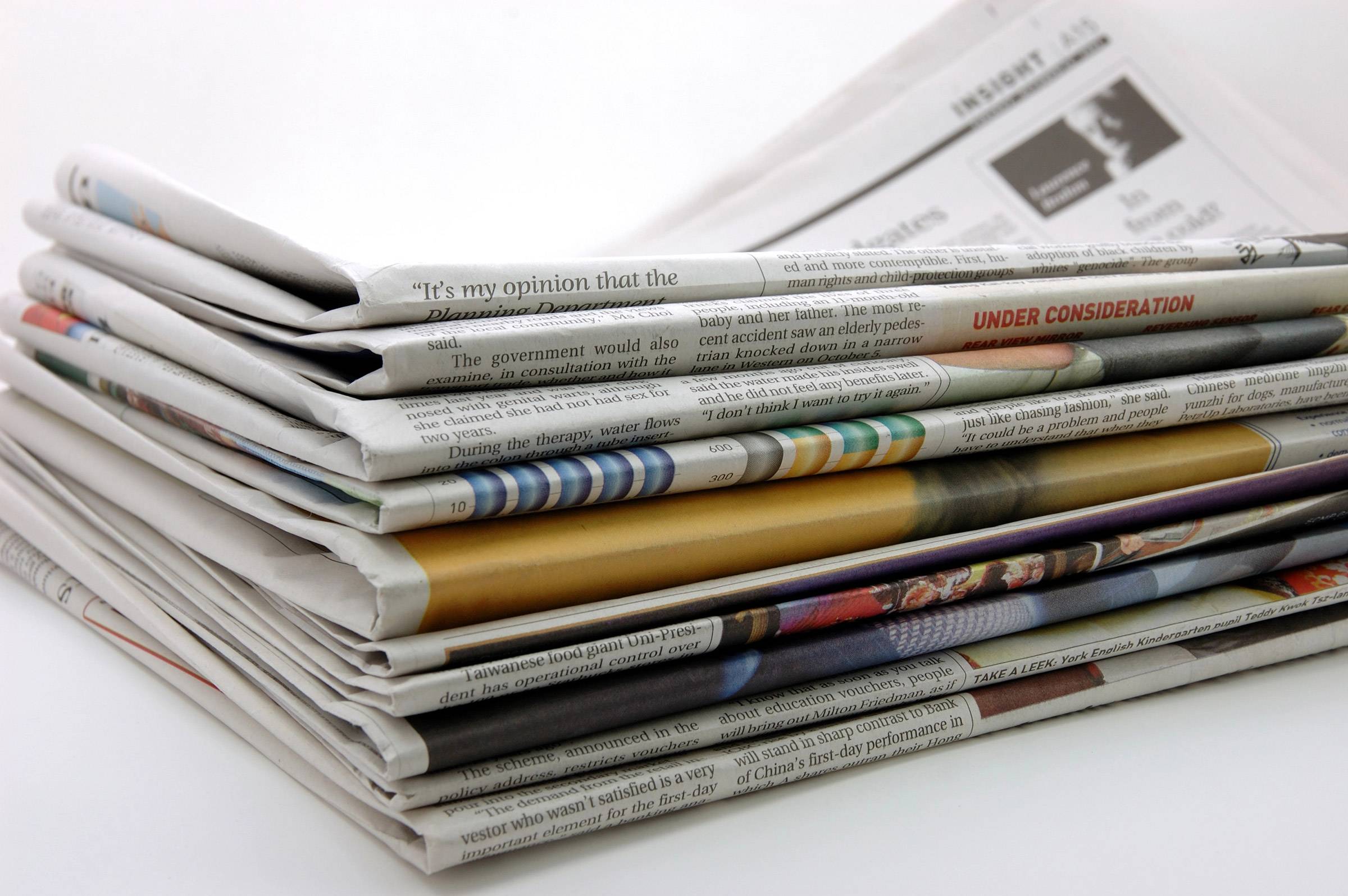 Newspapers folded and stacked
